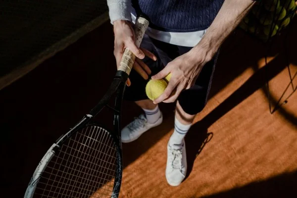 tennis serve action closeup